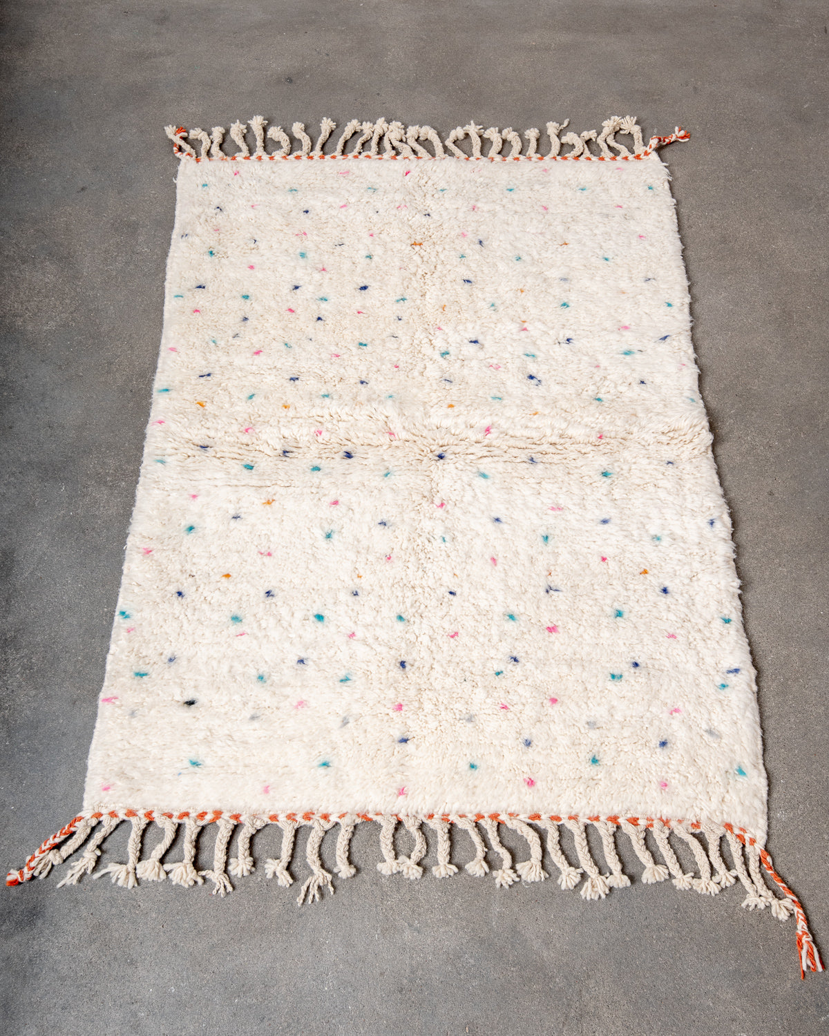 Modern, designer, handcrafted Berber rug from Morocco. Beniourain carpet with beautiful colours and patterns and fluffy wool texture.